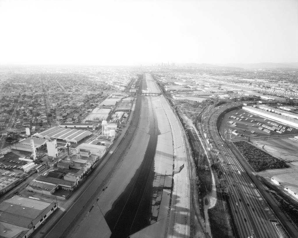Artwork image, Michael Light's L.A. River Looking Northwest, Long Beach Freeway at Right, Downtown in Distance