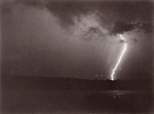 photograph of lighting striking ground