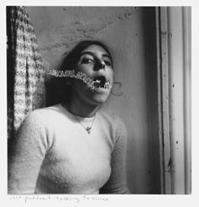 Francesca Woodman, photo of young woman with chain in mouth