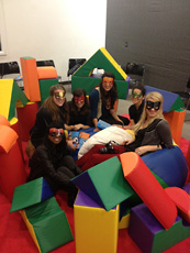 six people interacting with game