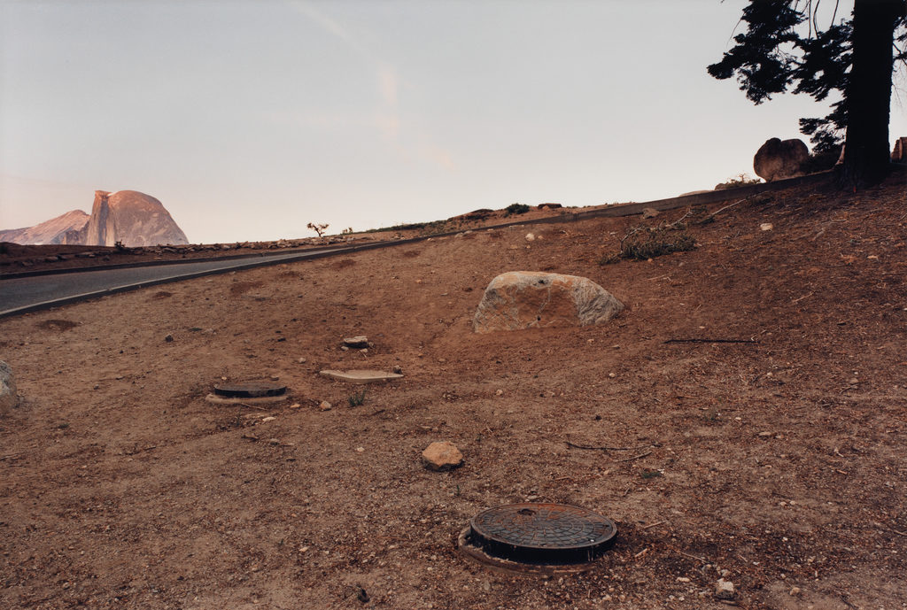Color photograph of a barren hillside