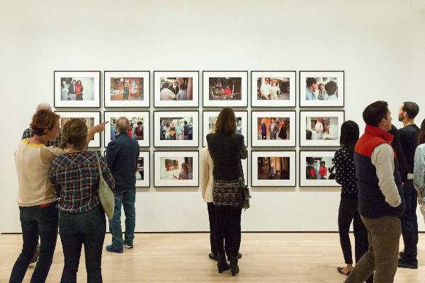 Visitors in a photography gallery during the ANthony Hernandez member preview