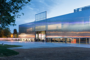 A sleek modern architectural facade comprised of mostly windows