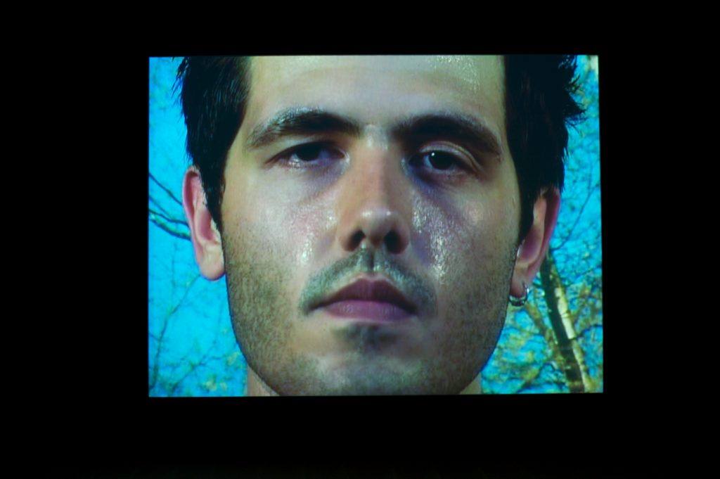 An image of a man's wet face