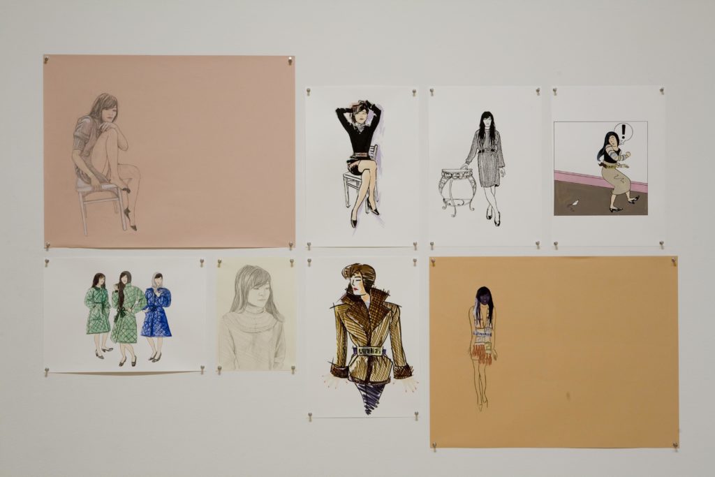 Several drawings of one woman in various illustration style