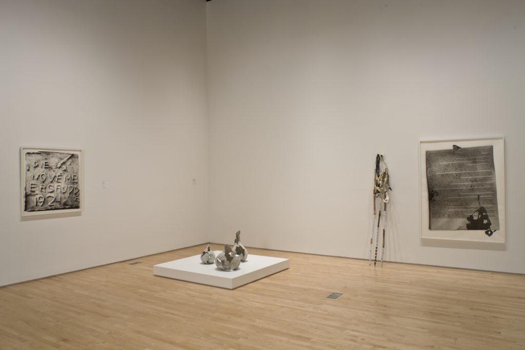 A room with several works by Paul Sietsema