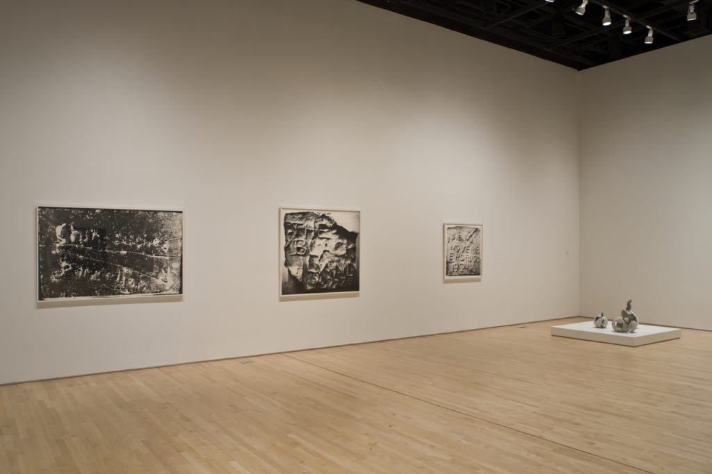 A room with several works by Paul Sietsema