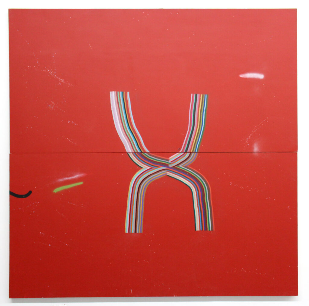 A rainbow striped X against two red, stacked horizontal canvases