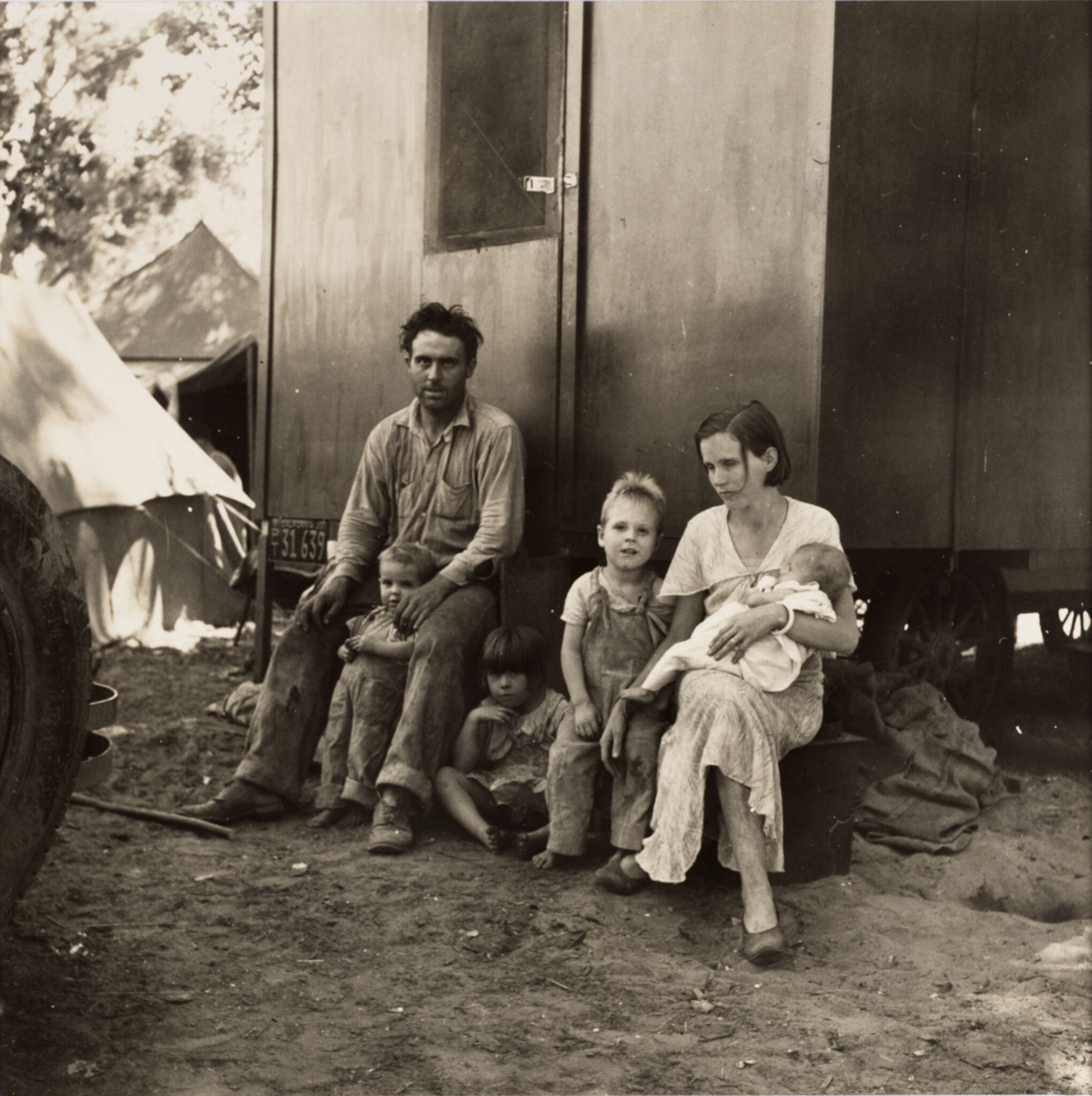 Dorothea Lange, A California Fruit Tramp and His Family in the